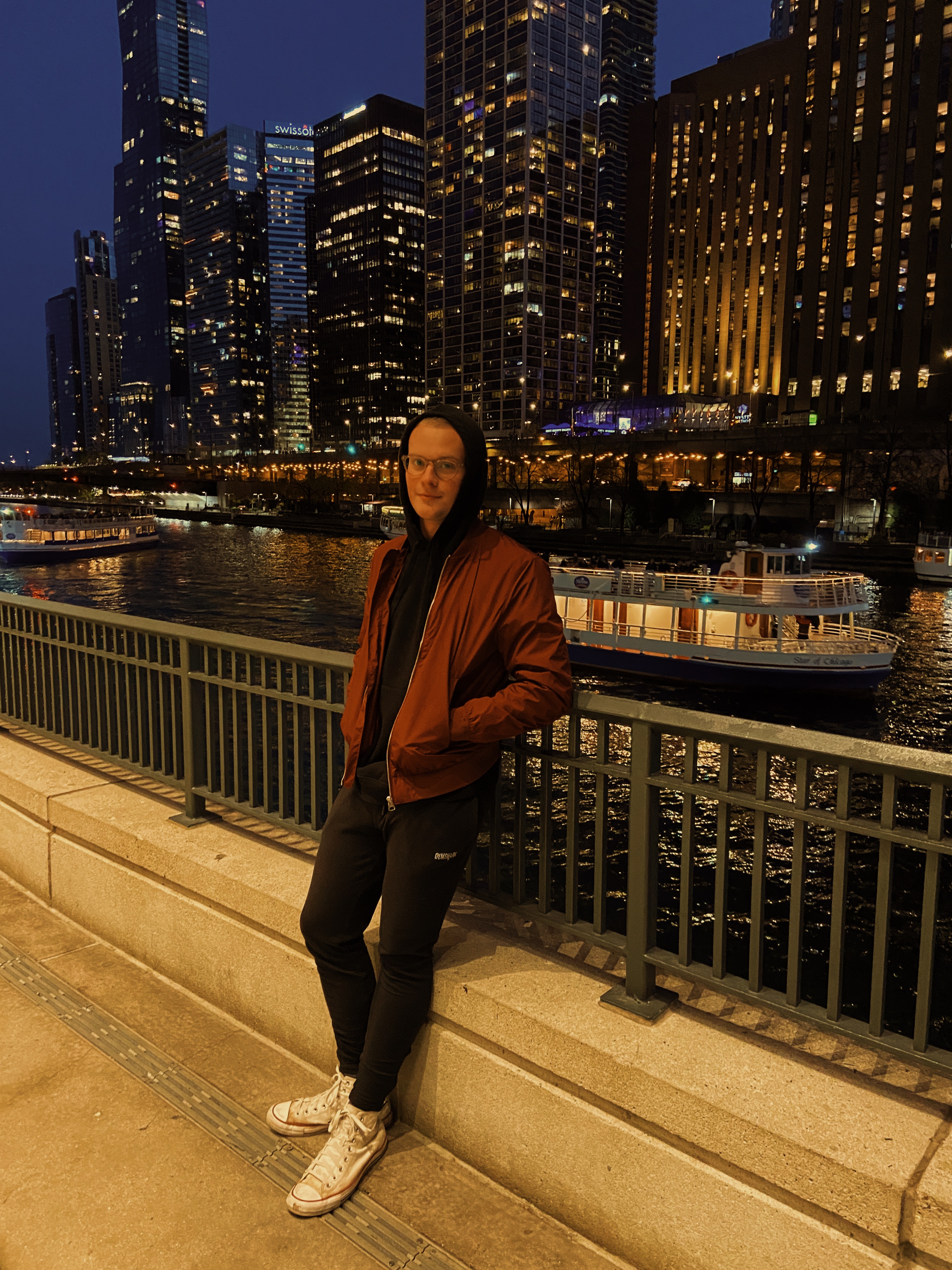 Picture of Jackson Ricketts on the Chicago Riverwalk at night.
